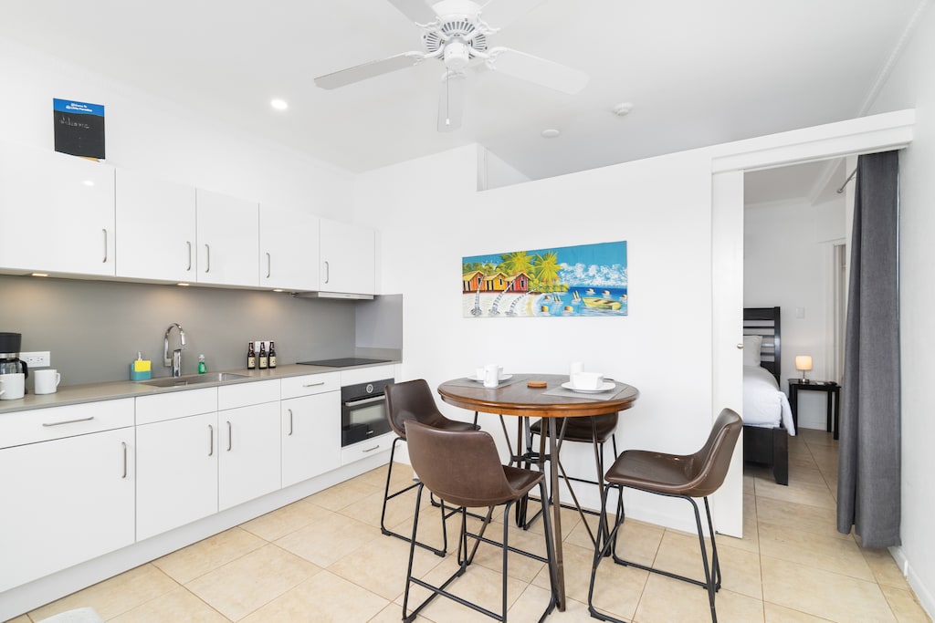 Lush Dining Area of the Apartment in Noord Aruba near Eagle beach - 4 Persons Dining - Neutral color palette with pops of vibrant hues for a chic contrast