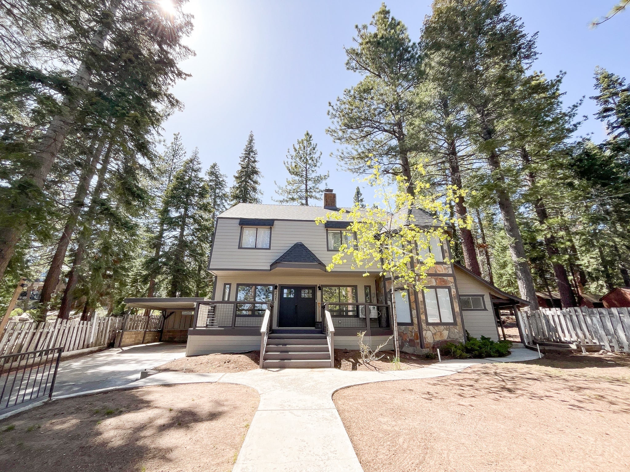 Gather your group for an unforgettable stay in this newly remodeled 7-bedroom home right across the street from Lake Tahoe!