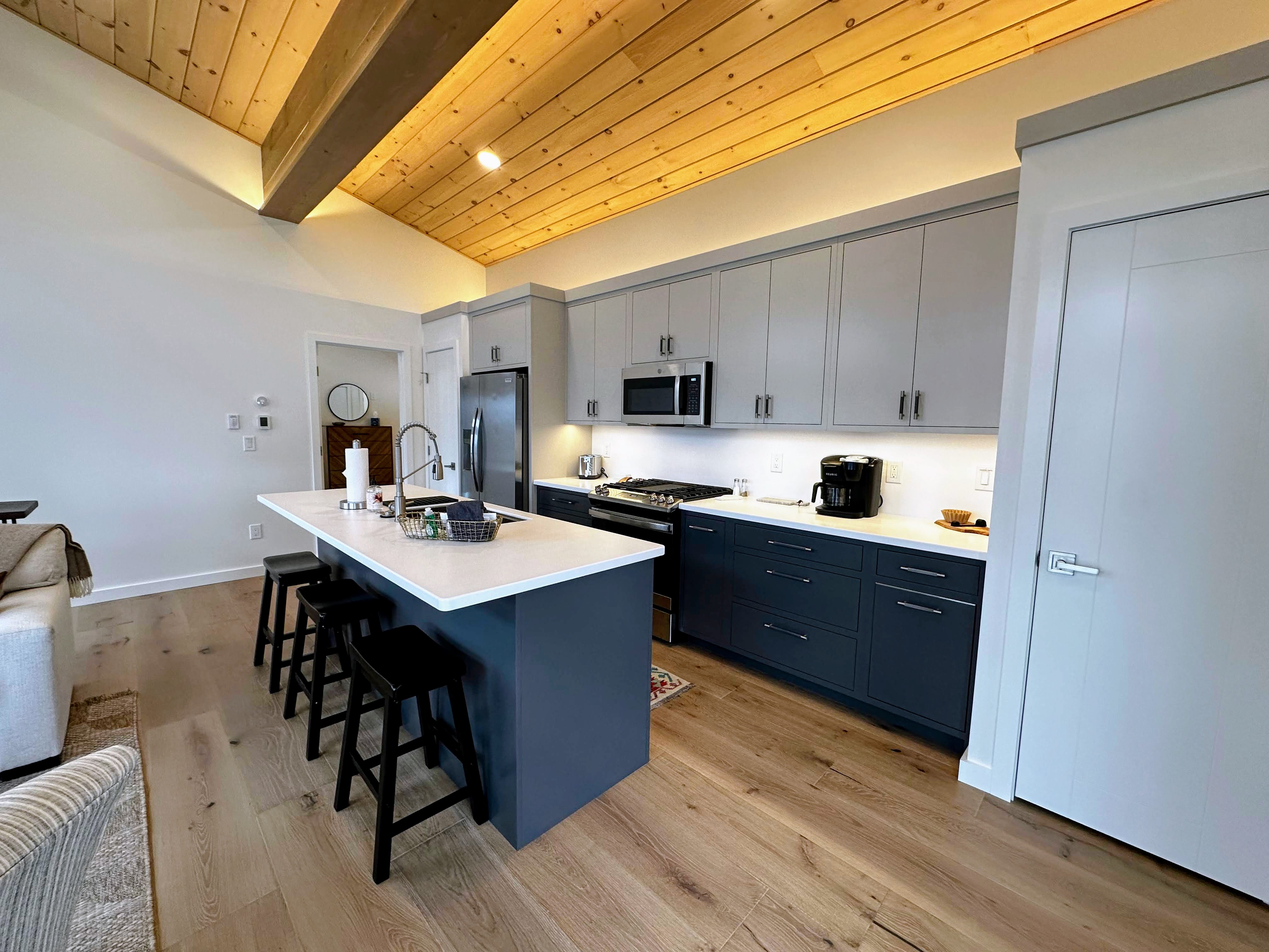 Kitchen with breakfast bar and new appliances