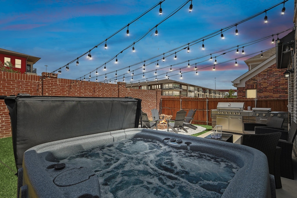 Nothing soothes away the stresses of daily life like a relaxing soak in a hot tub unless the warm glow of twinkling string lights – aahh …