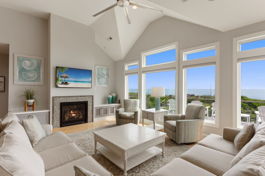 Unwind in the spacious Living Area with a Flat Screen TV and plenty of natural light.