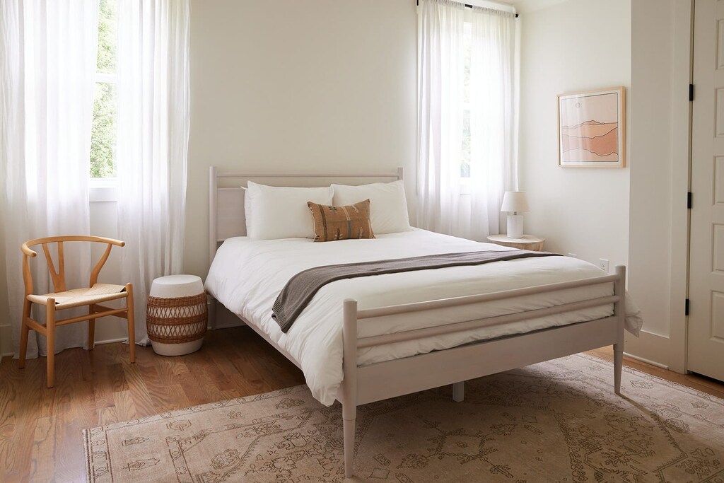 Enjoy a spacious and comfortable queen-sized bedroom conveniently located on the first floor.