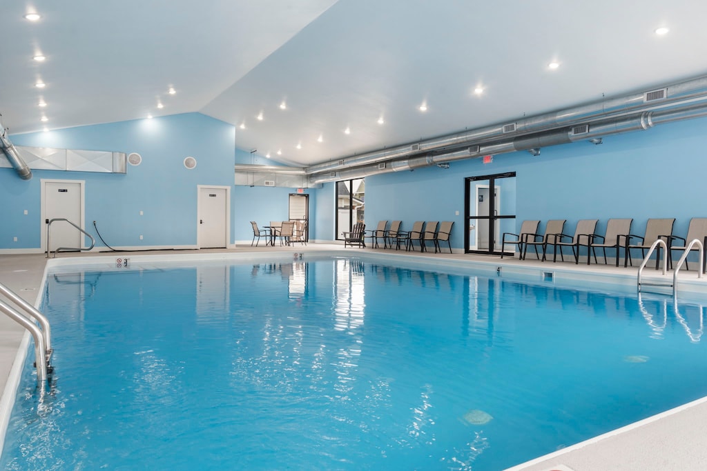 Indoor Community Pool- With Seating and Restrooms Available for Guests