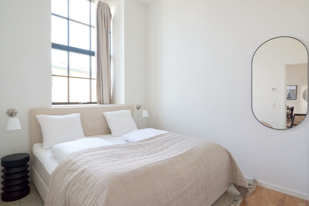 Indulge in the epitome of comfort and luxury with this apartment boasting three bright and spacious bedrooms, each adorned with a cozy king-size bed, providing an oasis of relaxation and tranquility for a truly rejuvenating stay.