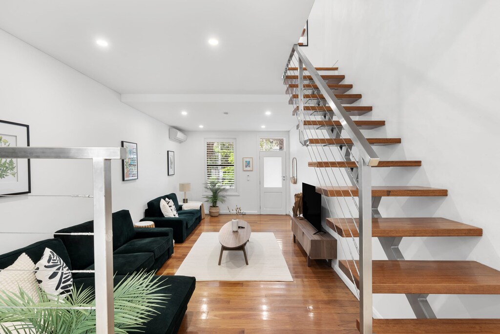 The sleek and spacious living room