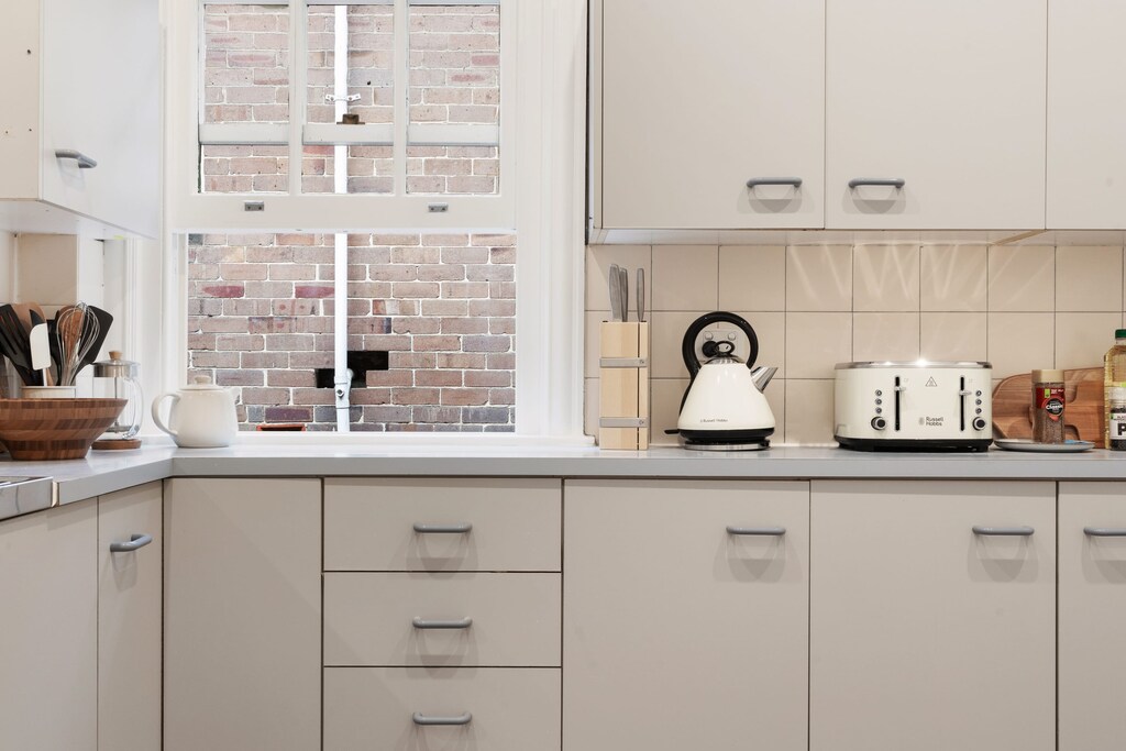 The fully equipped kitchen caters to culinary enthusiasts, providing all the essentials needed to prepare and enjoy delightful meals.