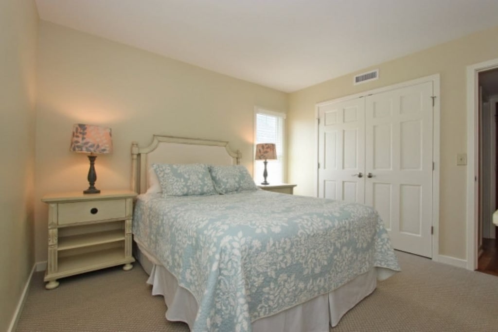 Bedroom 4 features a queen bed.