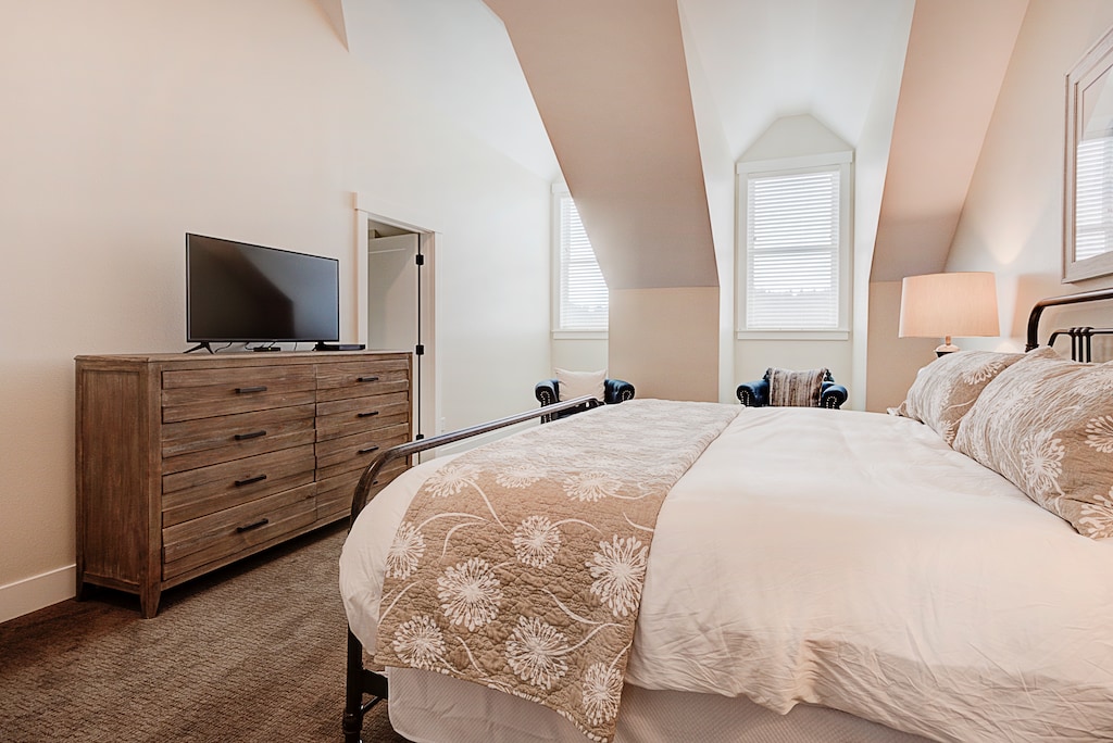 Cozy primary bed is perfect for a restful nights sleep
