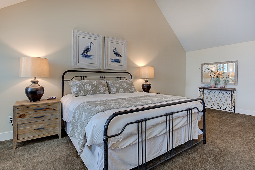 The primary bedroom is a serene and spacious retreat