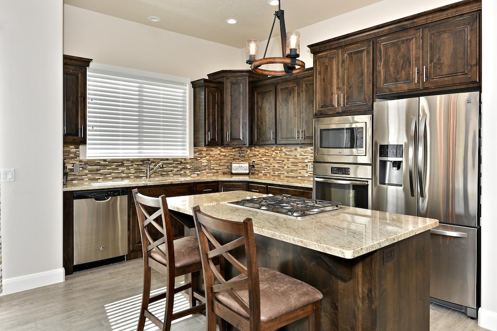 The Kitchen Island seats 2 adults and creates a great space for serving and preparing meals.