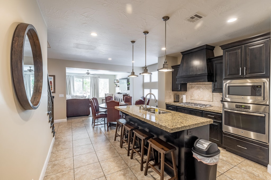 The Kitchen Island comfortably seats 4 adults and creates a great space for serving and preparing meals.