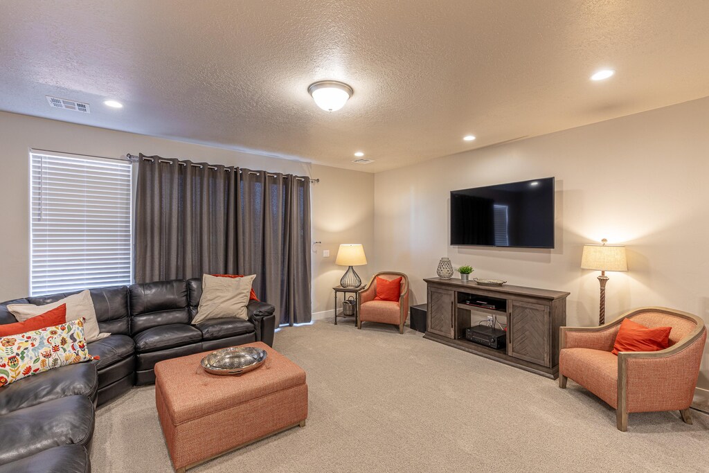 Watch your favorite show and relax in the Living Room after a long day of adventures.