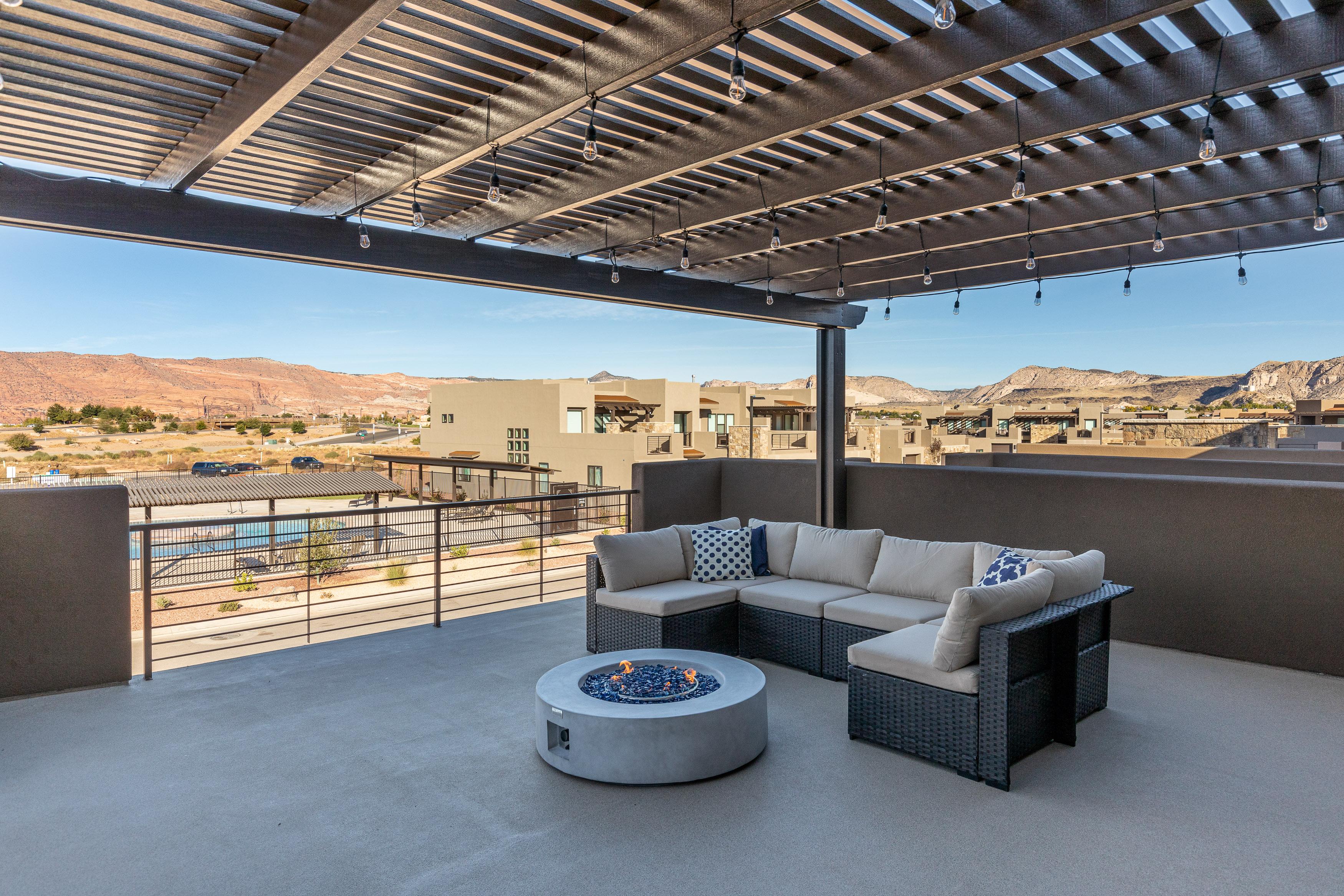 Enjoy the weather under the pergola while sitting in our comfortable patio furniture.