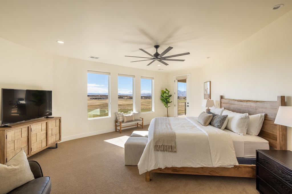 The main Bedroom has views of the The Ledges Golf Course with access to the back deck. 
