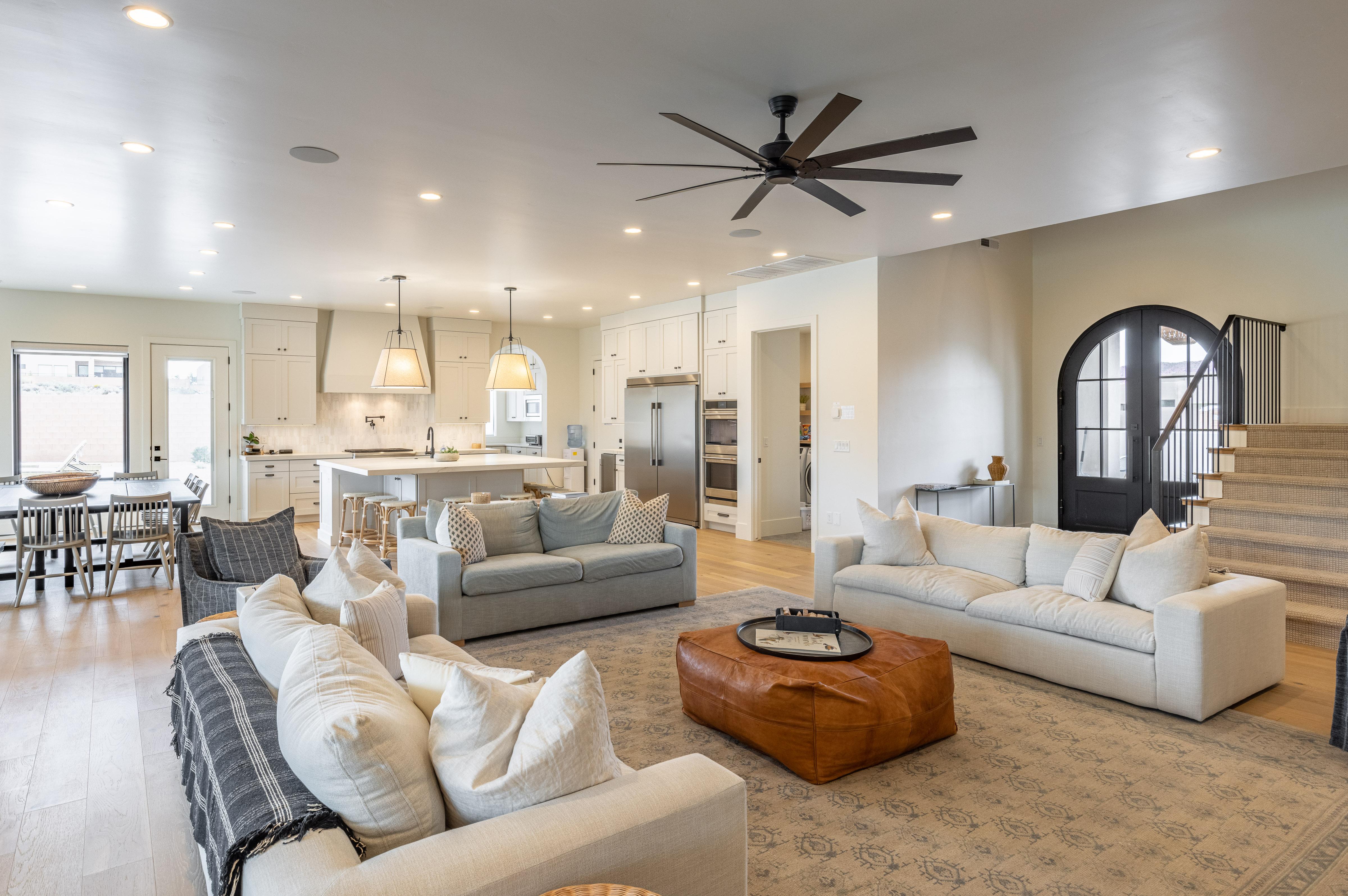 Beautiful view from the side door showing the living room, dining room, and kitchen.