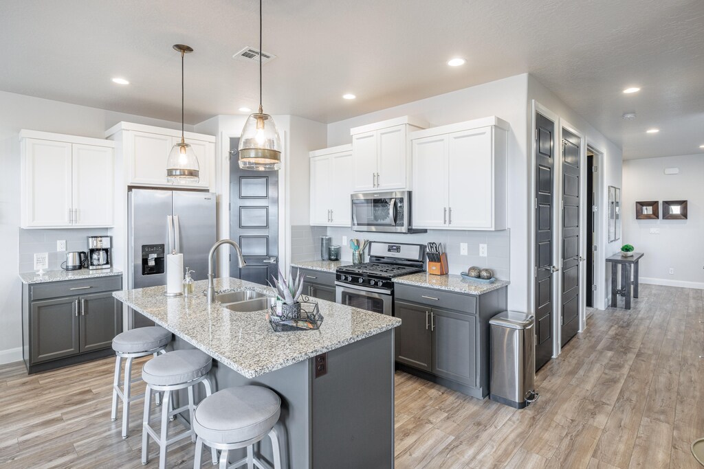 The Kitchen Island comfortably seats 3 adults and creates a great space for serving and preparing meals. 