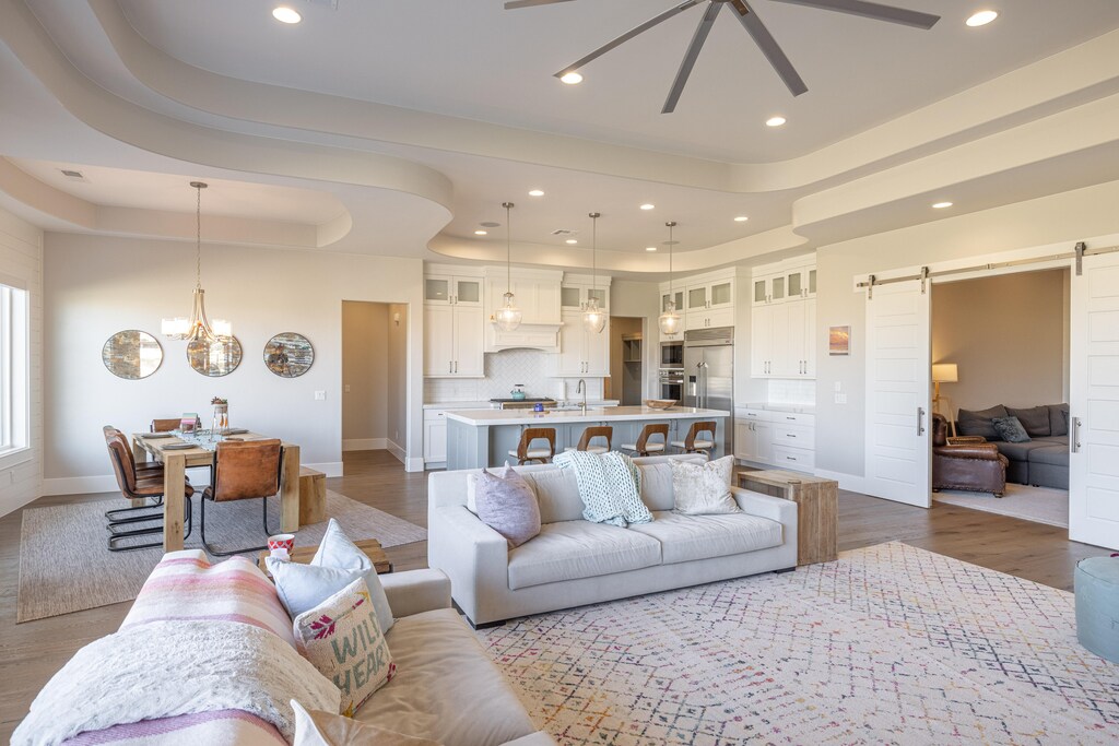 The Living Room is located adjacent to the dining room and is the perfect place to relax and watch your favorite movie or TV program.