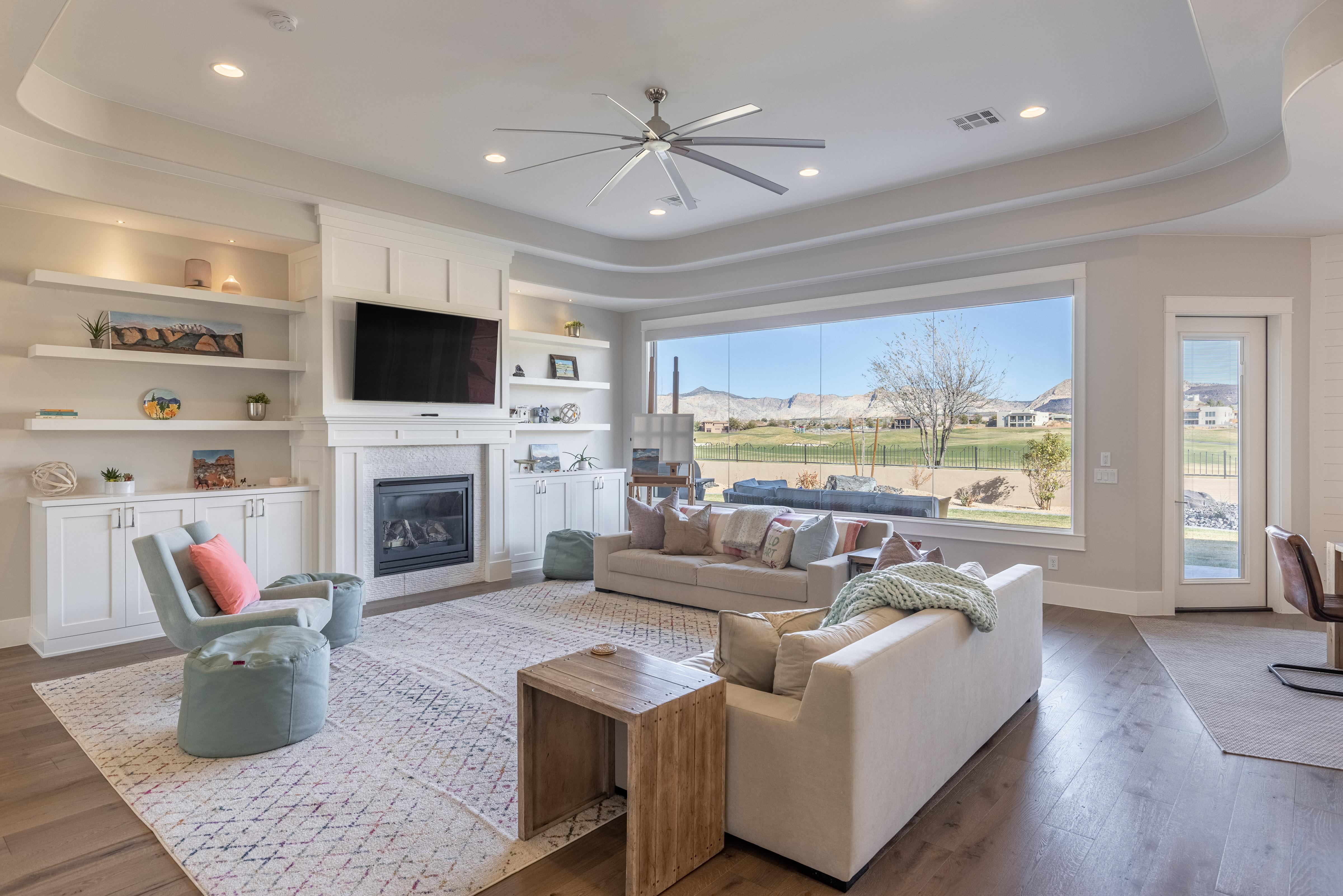 The living room has a beautiful view of The Ledges Golf Course.