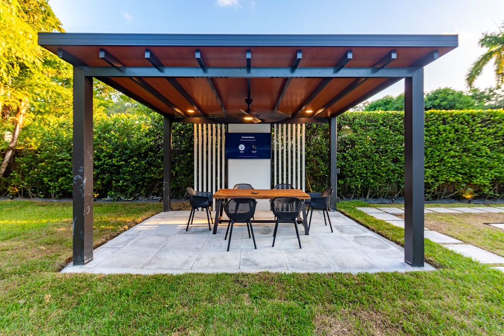 Cabana with a dining table and a Smart TV.