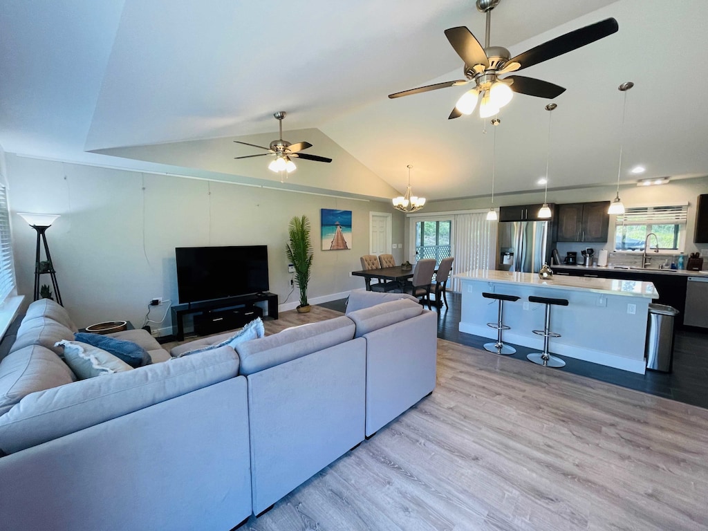 Spacious modern living room with clean lines, large windows for natural light, and sleek finishes that blend comfort with contemporary island charm.