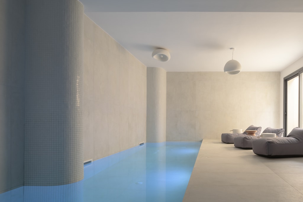 Dive into luxury with the heated indoor pool, a perfect retreat for relaxation.
