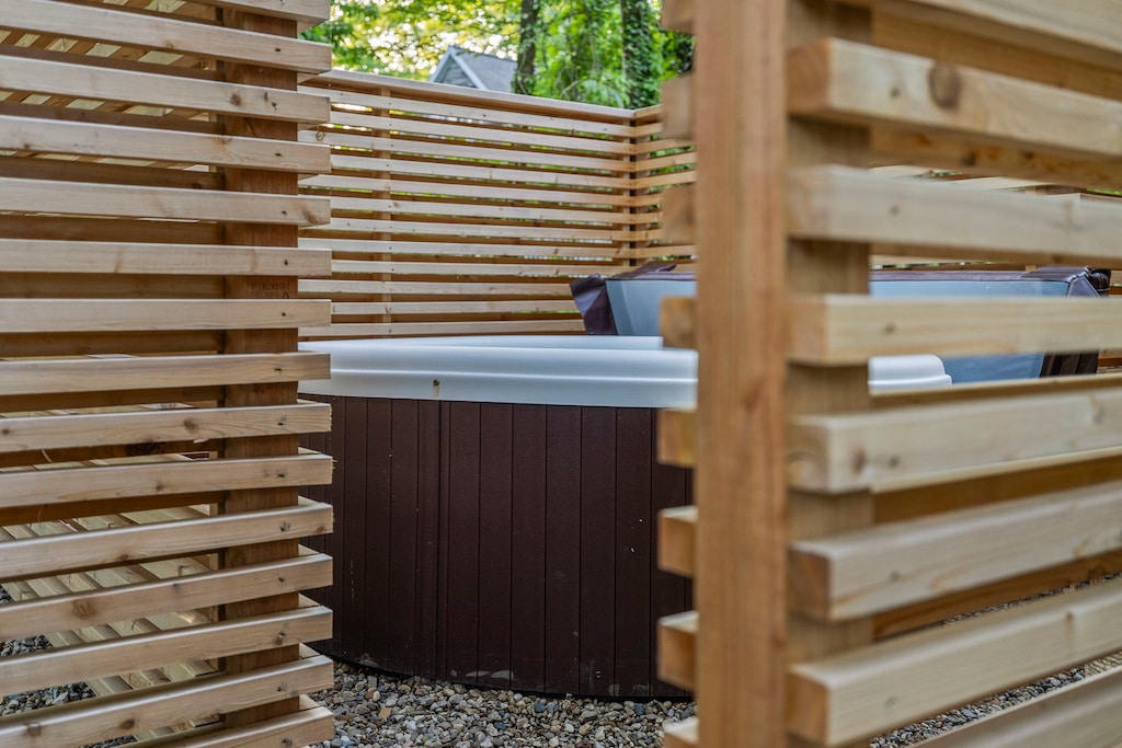 Soaking up the good vibes in this cozy wooden hot tub.