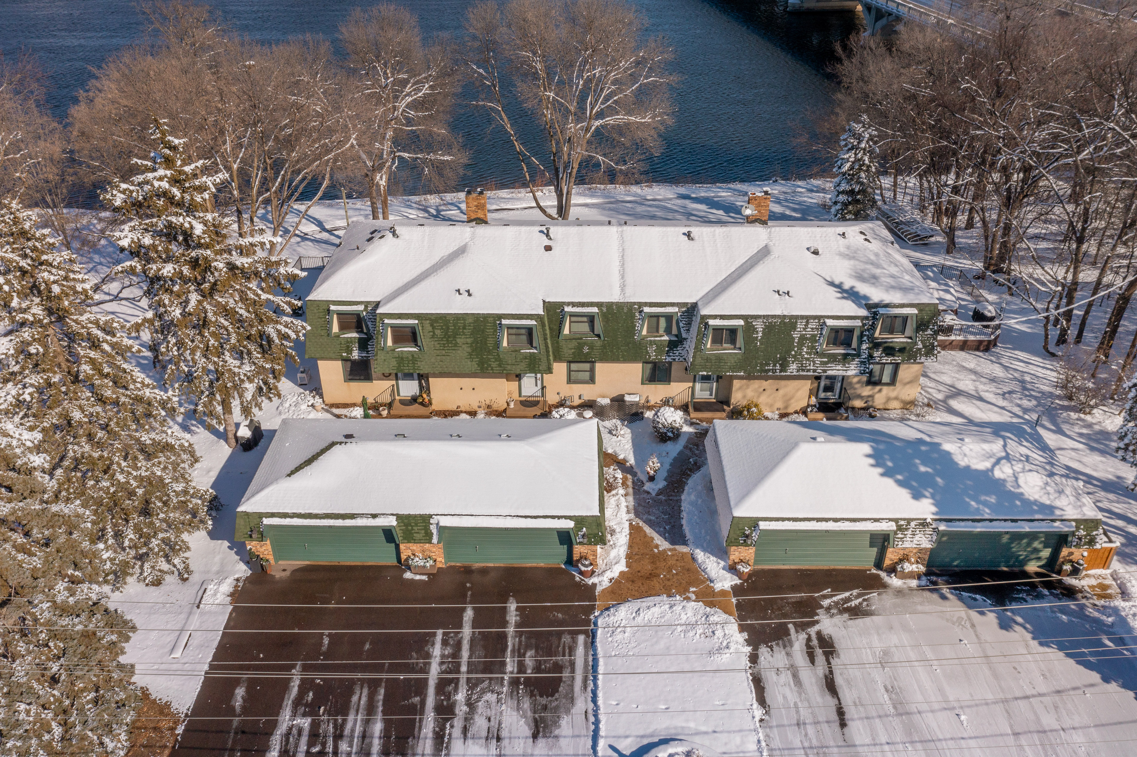 Property Image 1 - Riverfront Champlin Townhome w/ Deck & Water View!