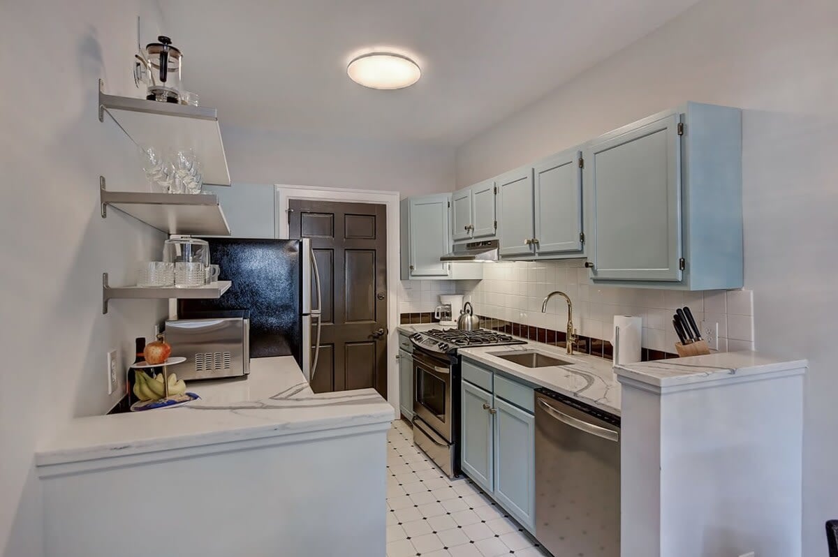 Kitchen with Fridge and Built-in Cabinet