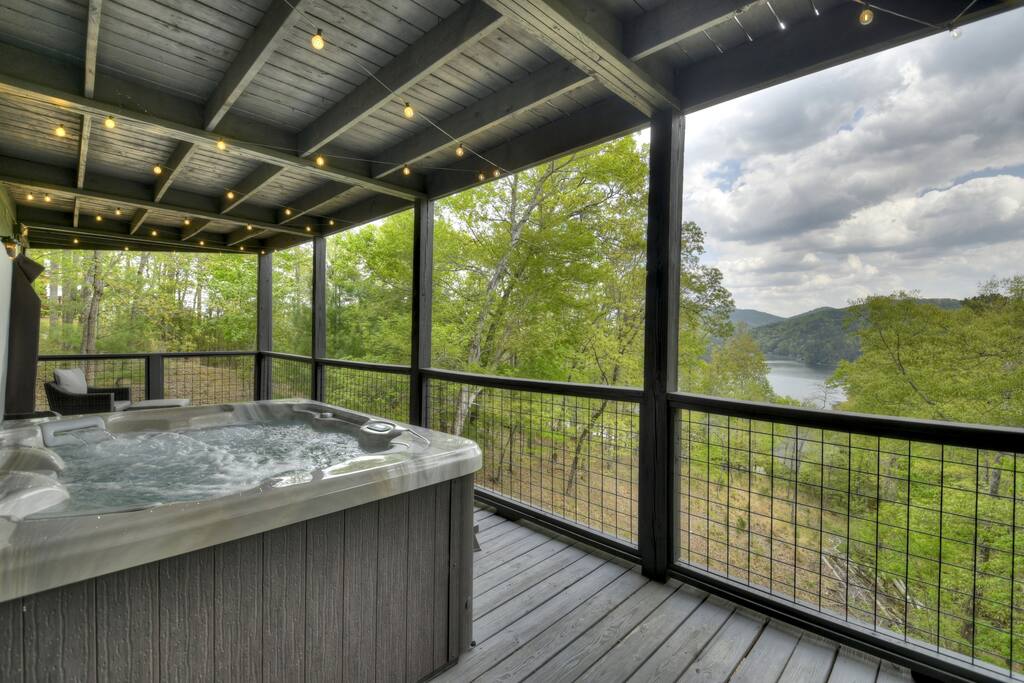 Lower level porch overlooking the lake and mountains