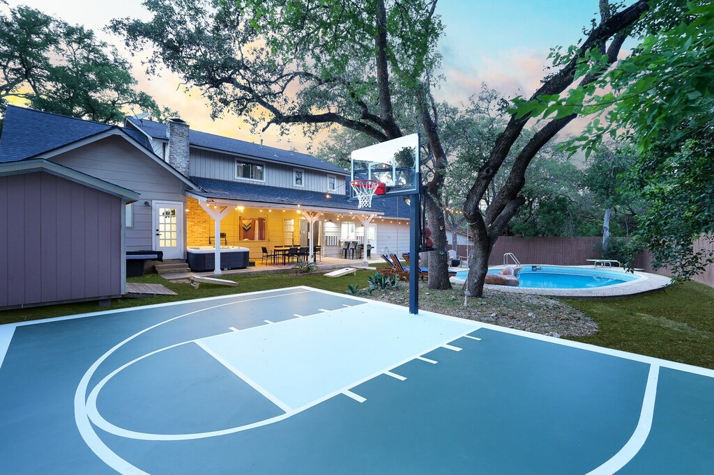 Our backyard basketball court is ready for your best shots!
