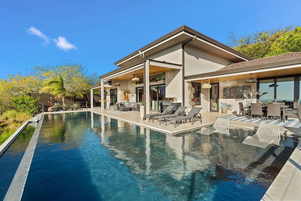 Outdoor Patio with Infinity Pool and Seating
