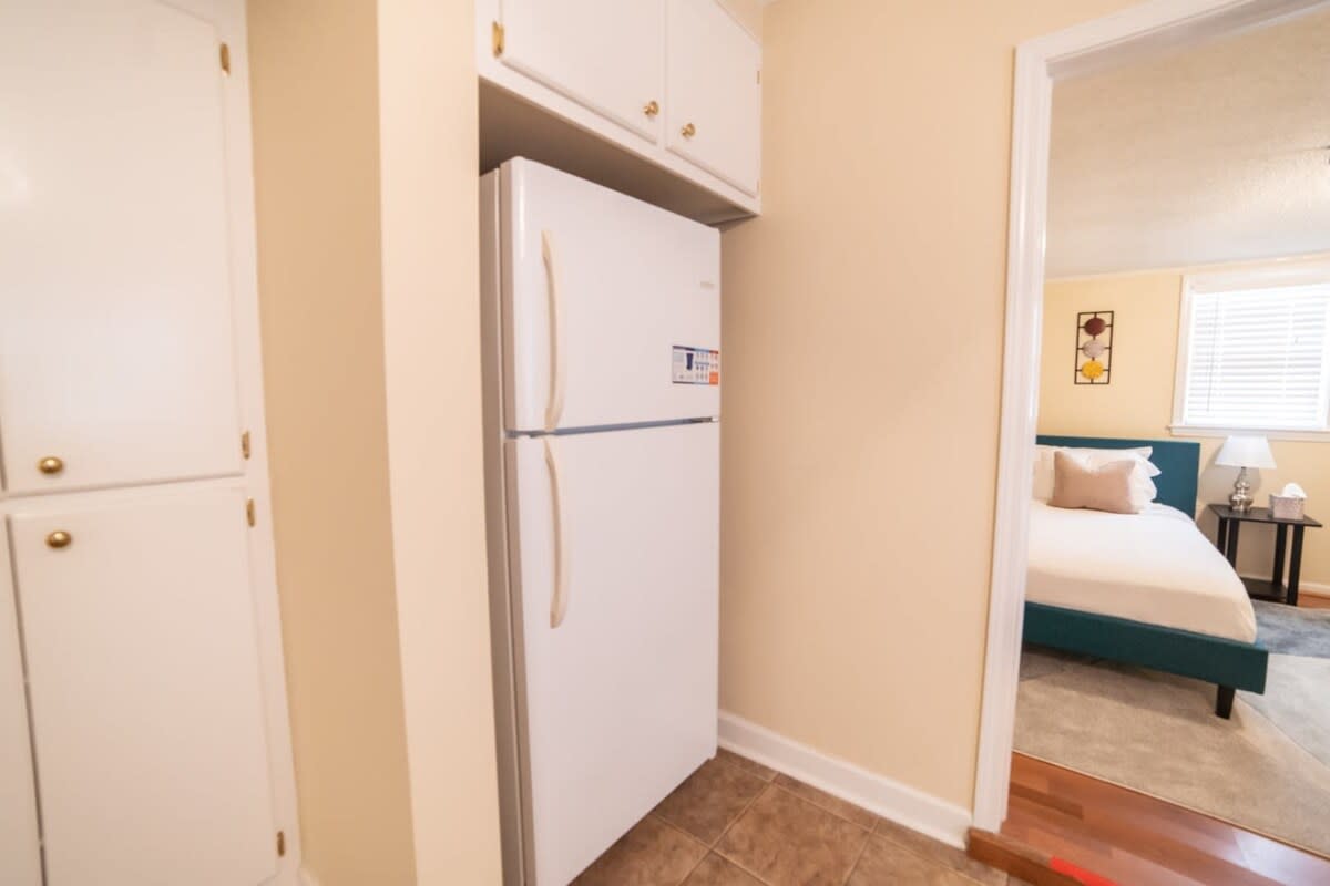 Bedroom and refrigerator