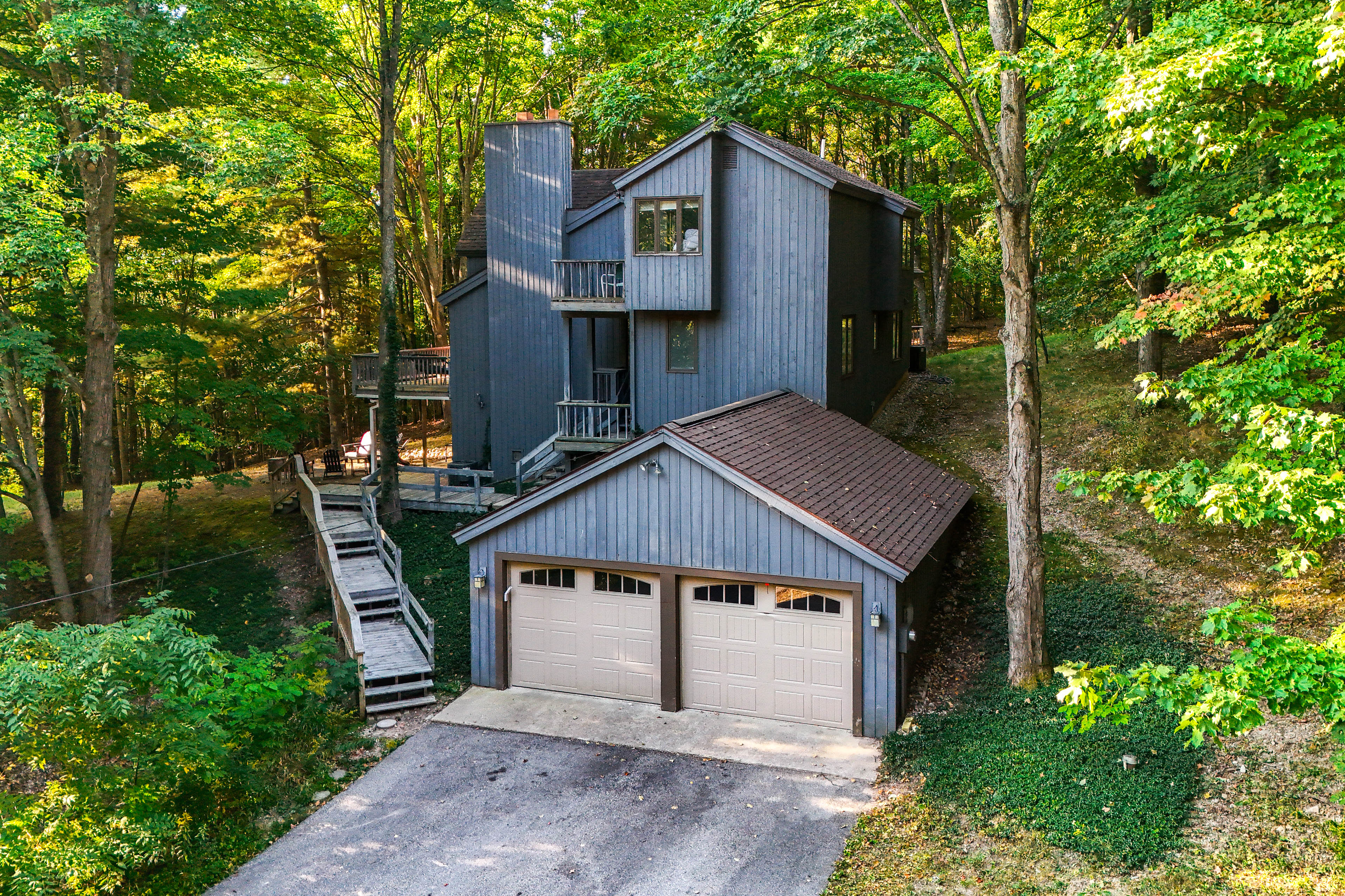 Serene Suttons Bay Home w/ Fire Pit & Wooded Yard