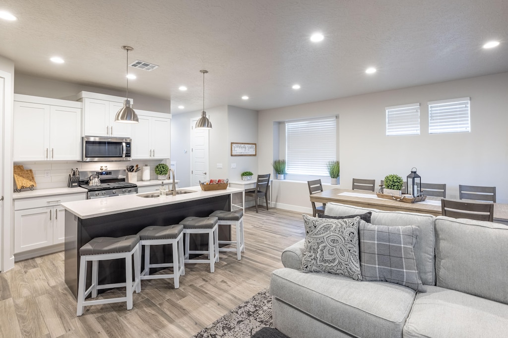 The Kitchen Island comfortably seats 4 adults and creates a great space for serving and preparing meals.