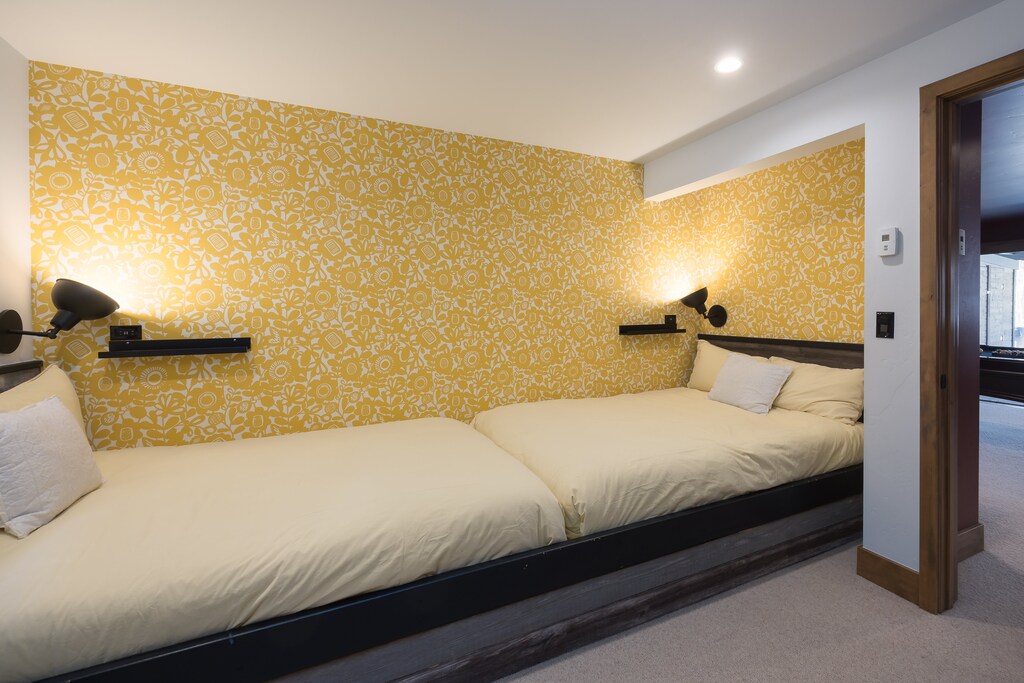 two built-in Full beds with reading lights and closet.