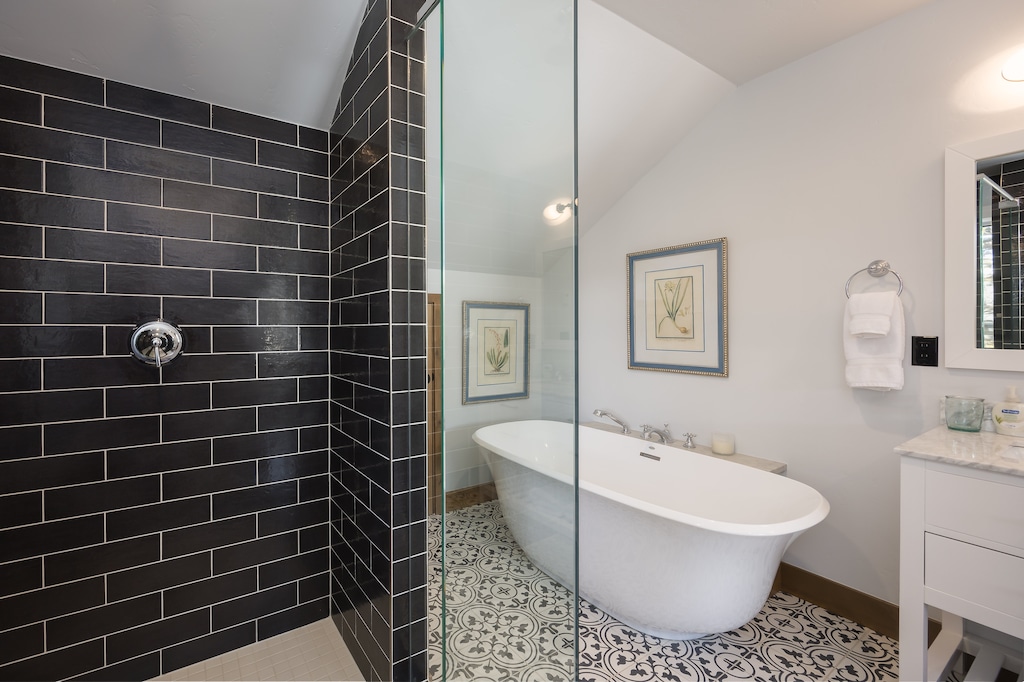 walk-in shower, two vanities built-in towel warmer