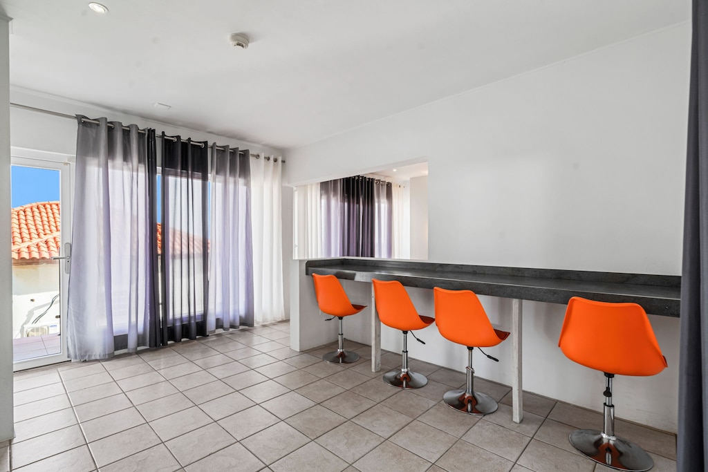 Apartment living area with kitchen bar