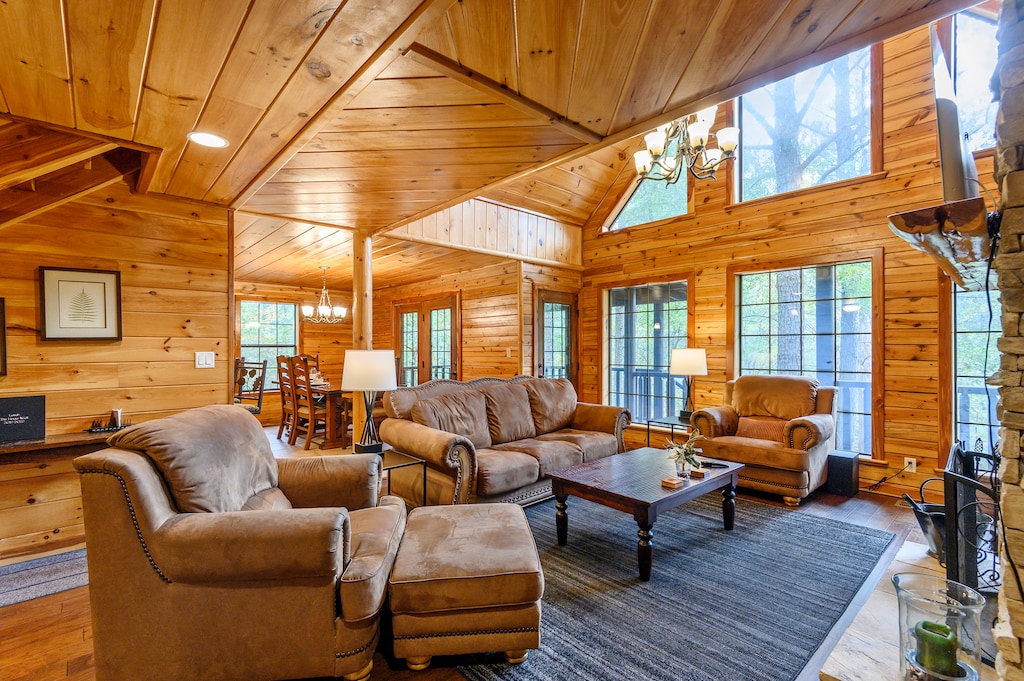 The living room features comfortable seating that invites guests to sink into relaxation.