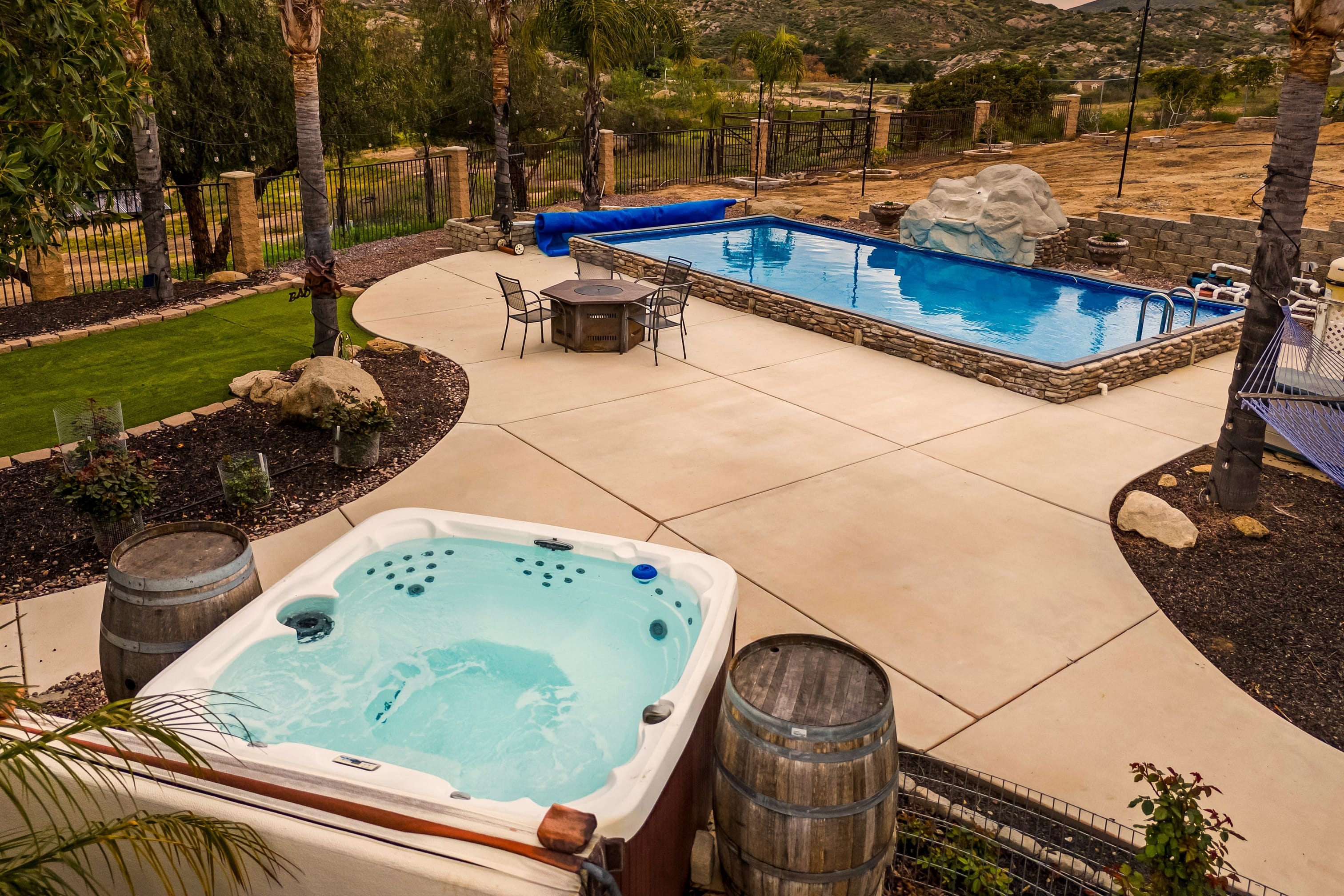 Private pool and hot tub for ultimate relaxation.