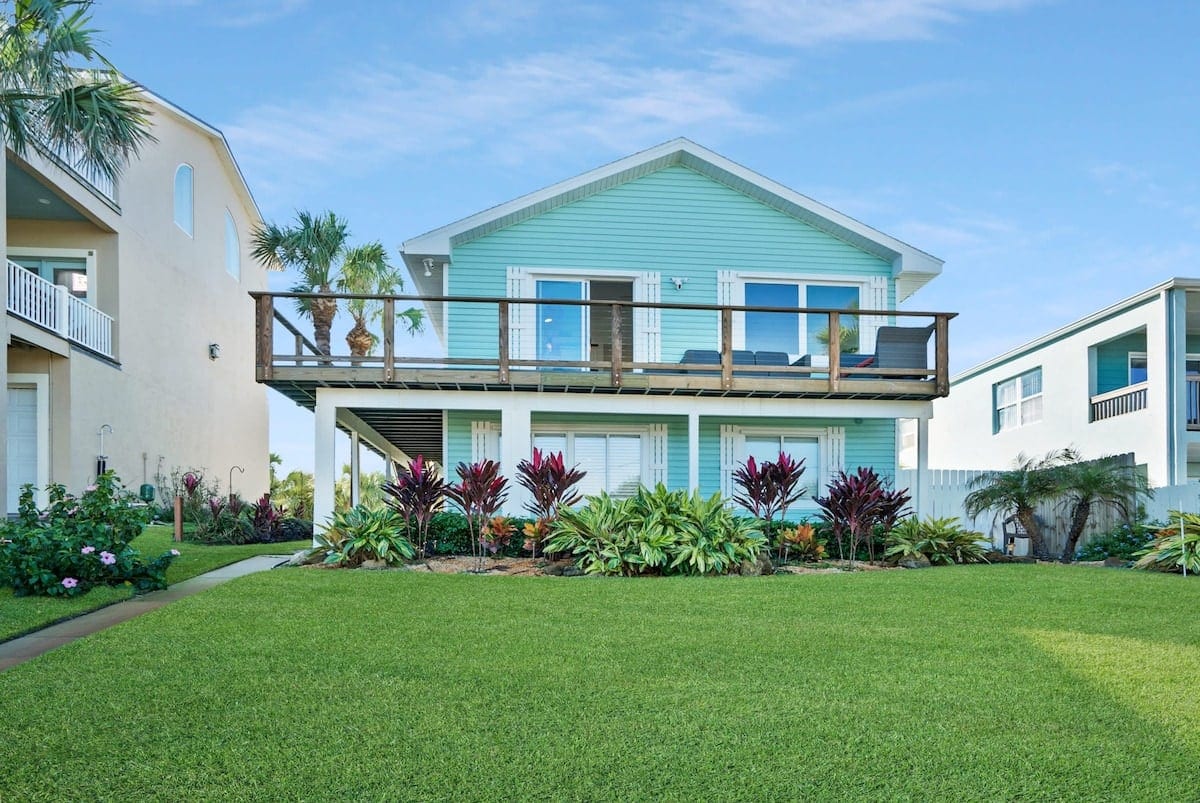 View of the front of the home from the ocean side. The top patio is all yours!