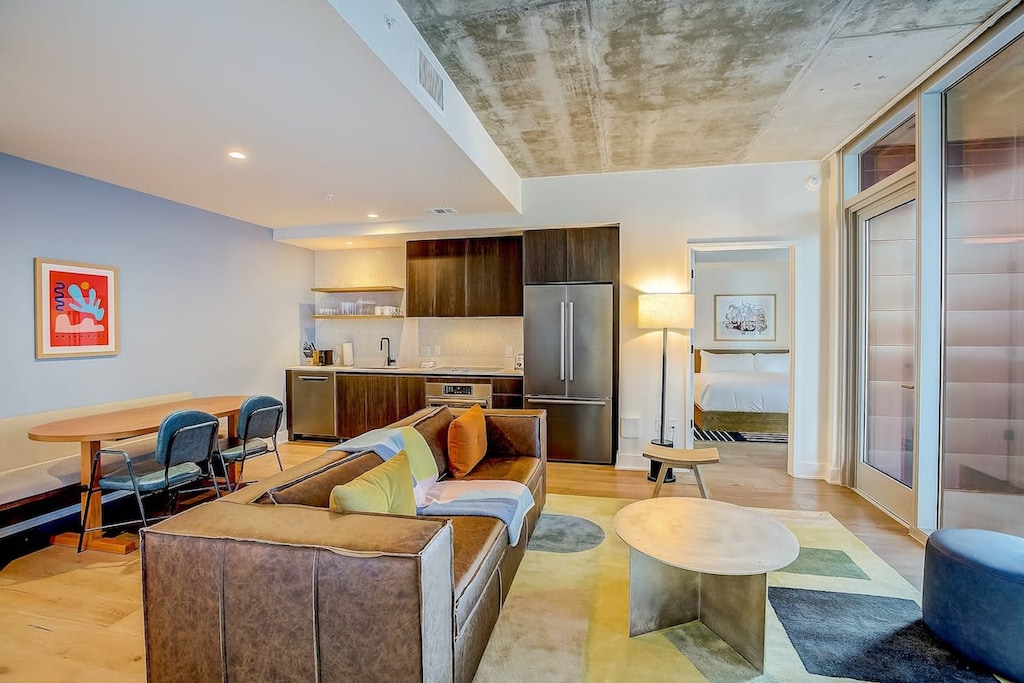 Open living room, dining and kitchen