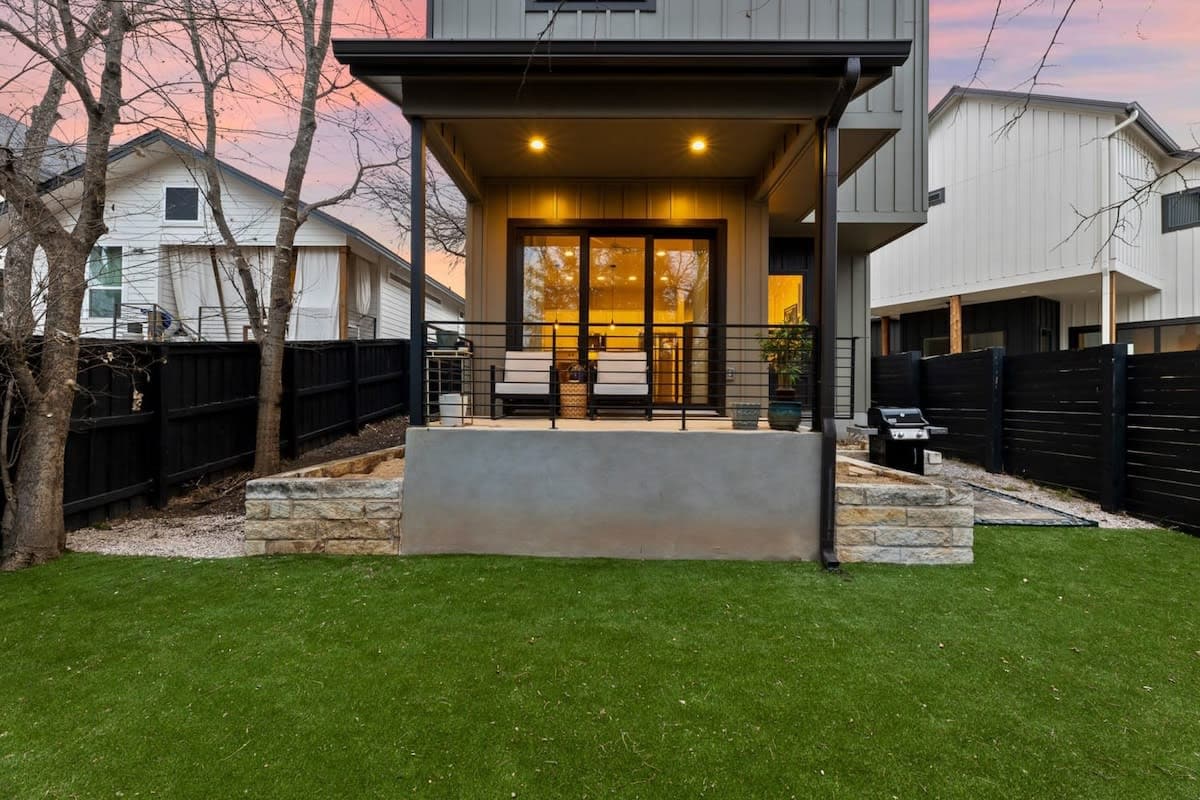 Backyard with seating area and grill