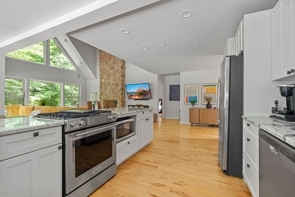 The heart of the home: a kitchen that flows effortlessly into a warm, inviting living space.