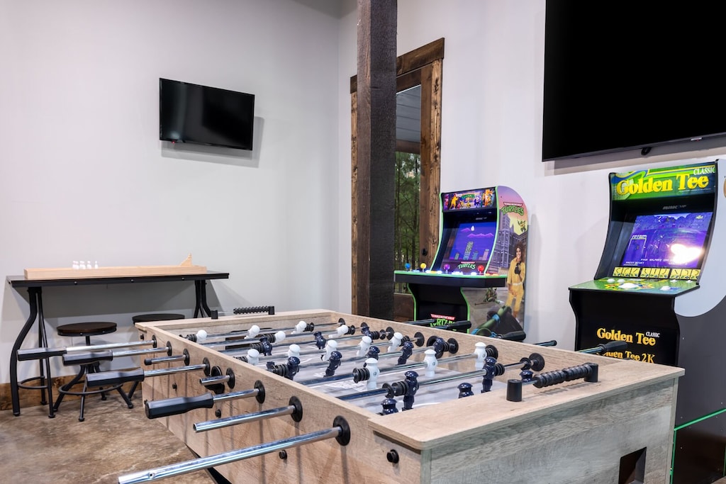 Foosball table and arcade games