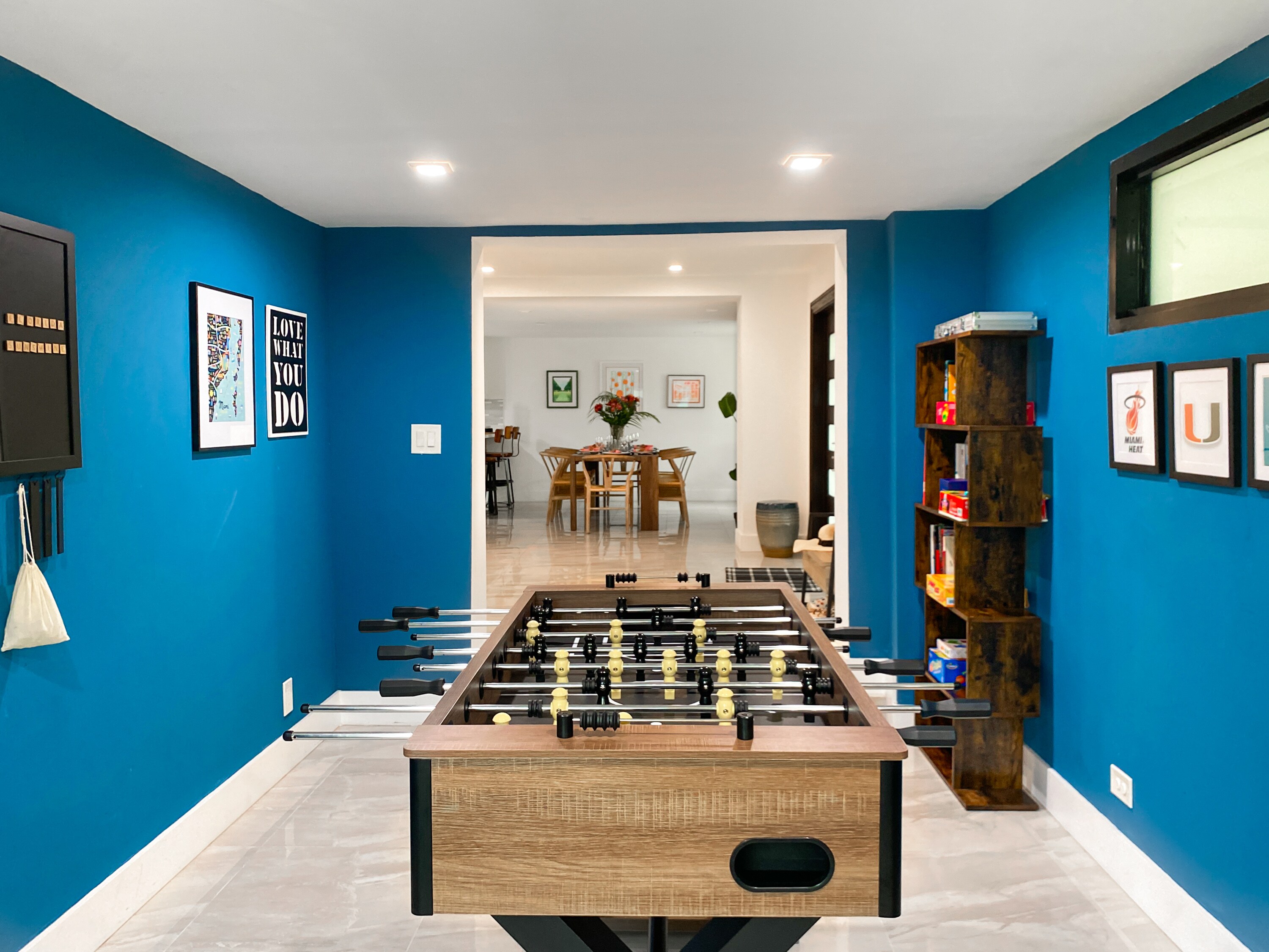 Game Room | Direct view into dining.