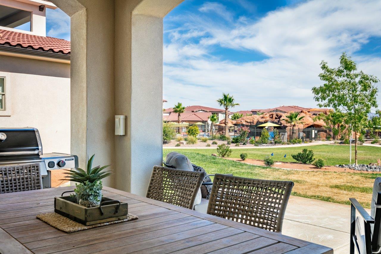 Enjoy easy access to amenities (see previous photo) and the pool from the patio of this home