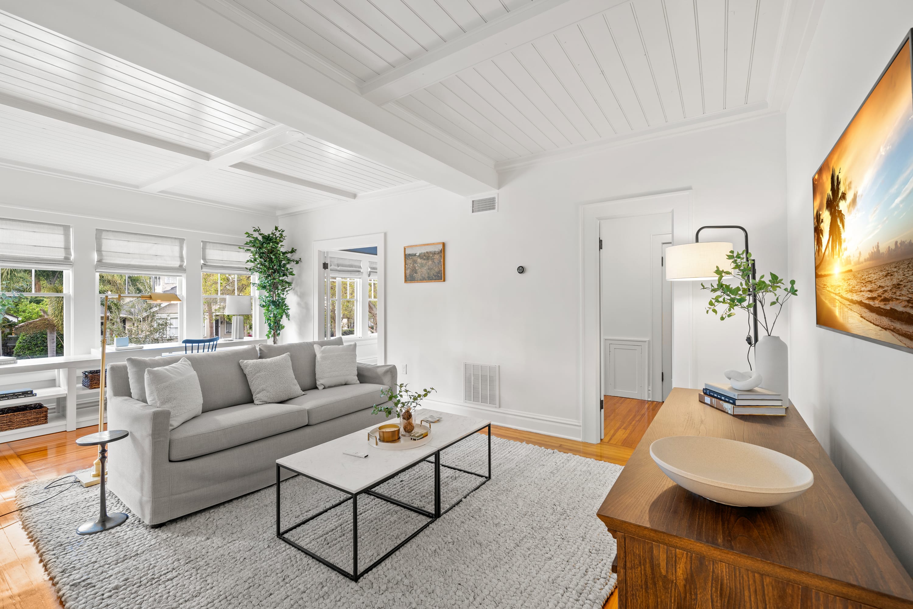 Sunlit Living Area with Samsung Frame TV and Workspace