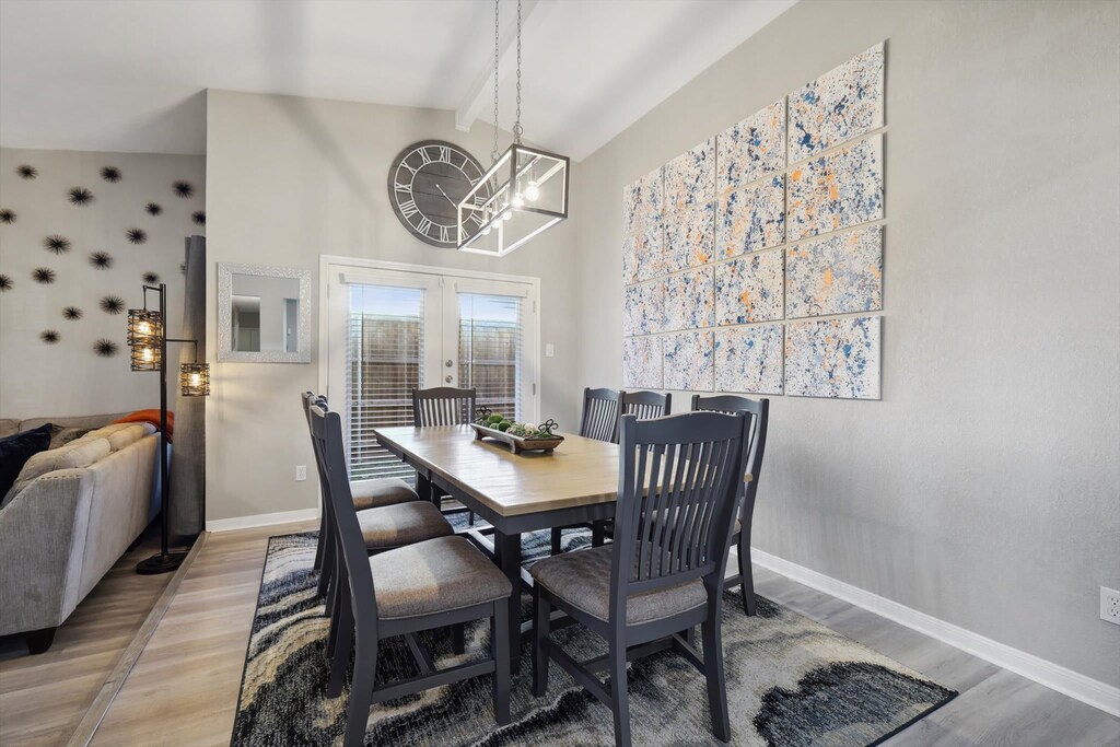 Gather around this spacious dining room and enjoy a lovely meal in the company of some of your favorite people – bon appetit!