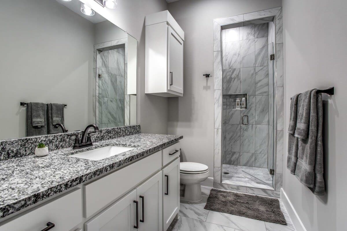 With an extended vanity for plenty of space and an extra large mirror, this bathroom will ensure you start and end every day on the right foot!