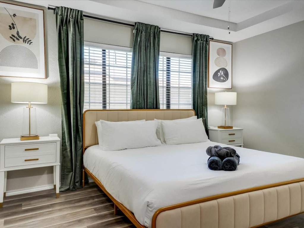 Featuring a king-sized bed, matching nightstands, and a dedicated TV, you can curl up in bed with your favorite movie as if it’s your own home!